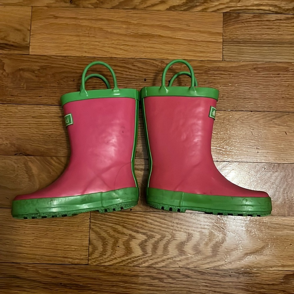 Watermelon color Oaki wear rain boots, size 9